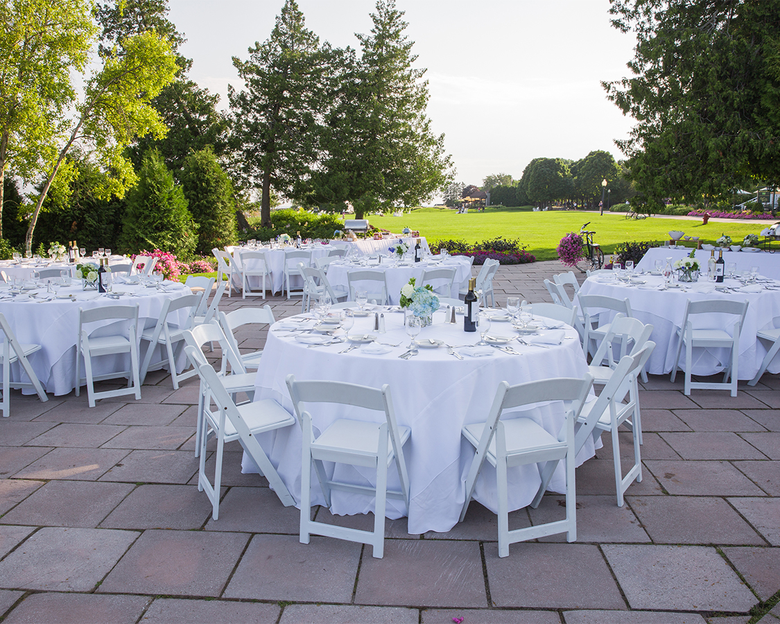 a group of tables set up outside