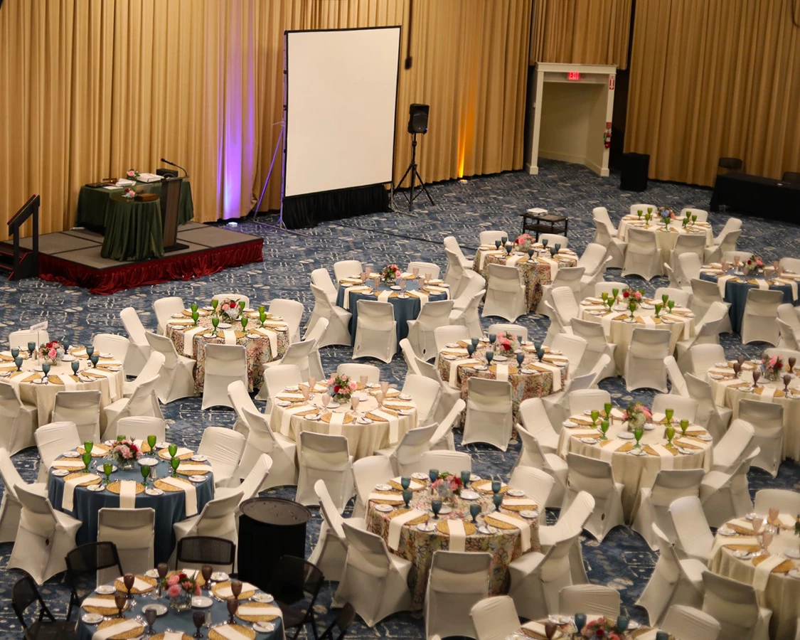 a large room with tables and chairs