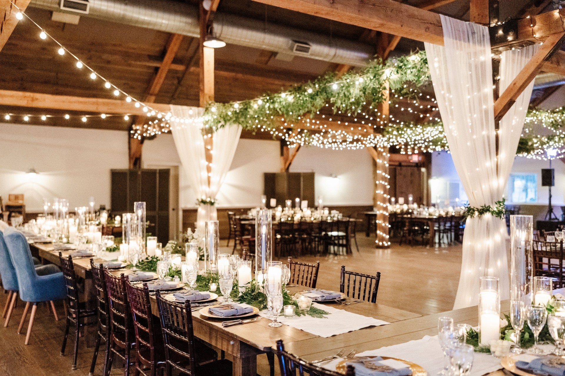 a long table set for a wedding reception by AnnMarie Swift Photo