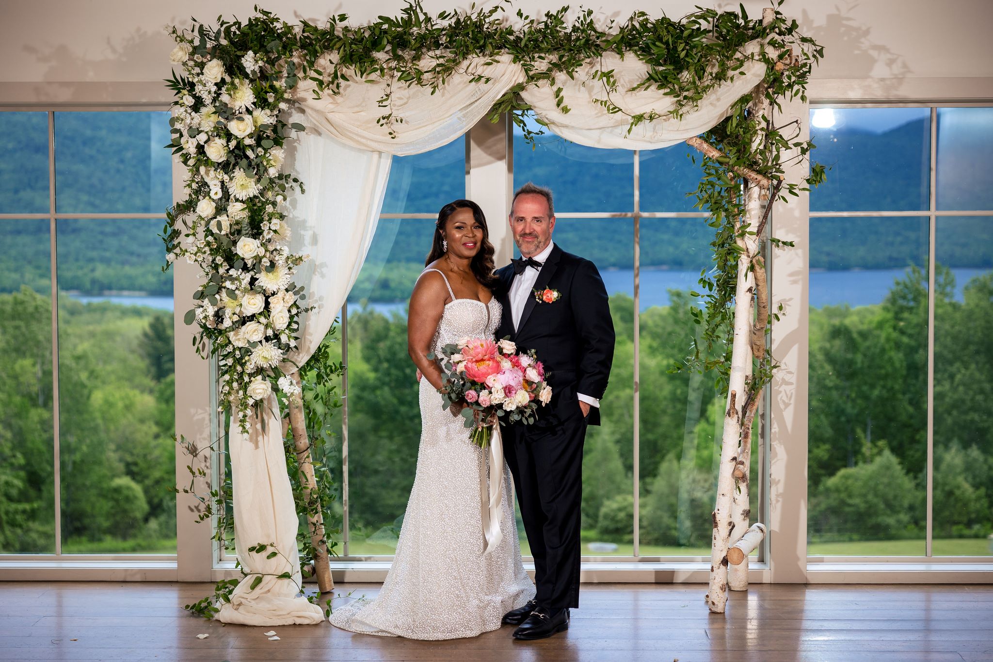 a man and woman posing for a picture by Garren Tee Photo