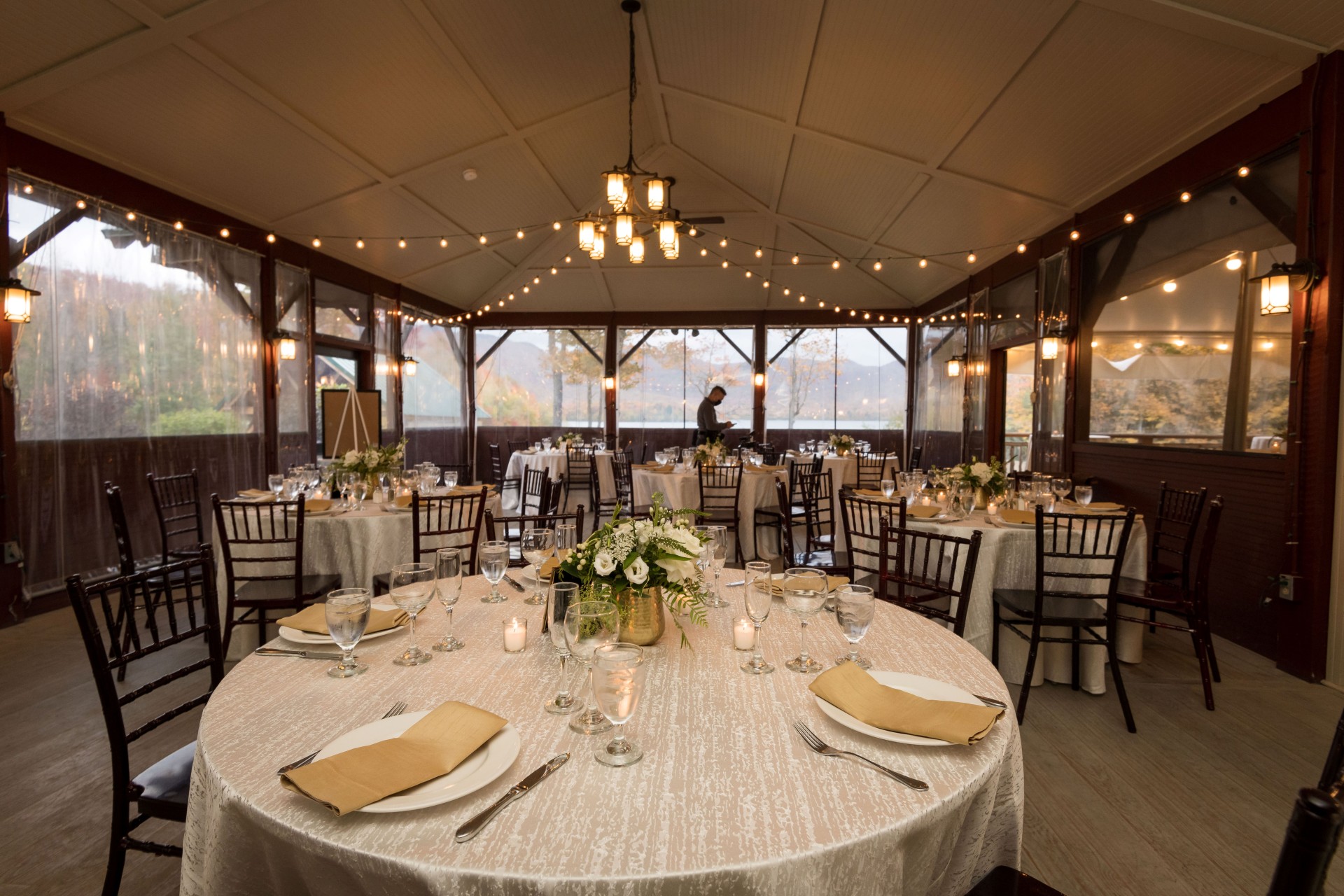 a room with tables and chairs