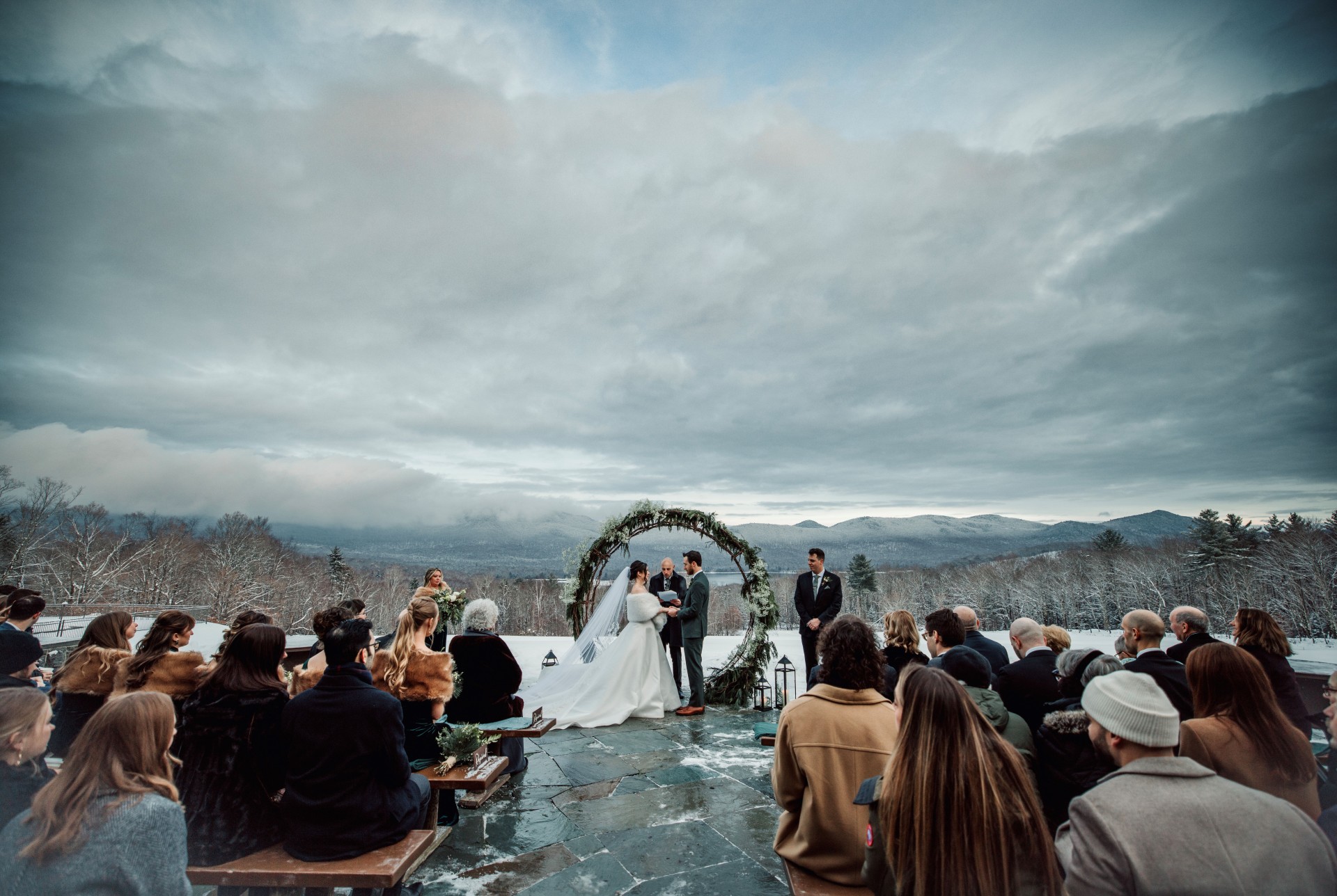 a group of people at a wedding ceremony