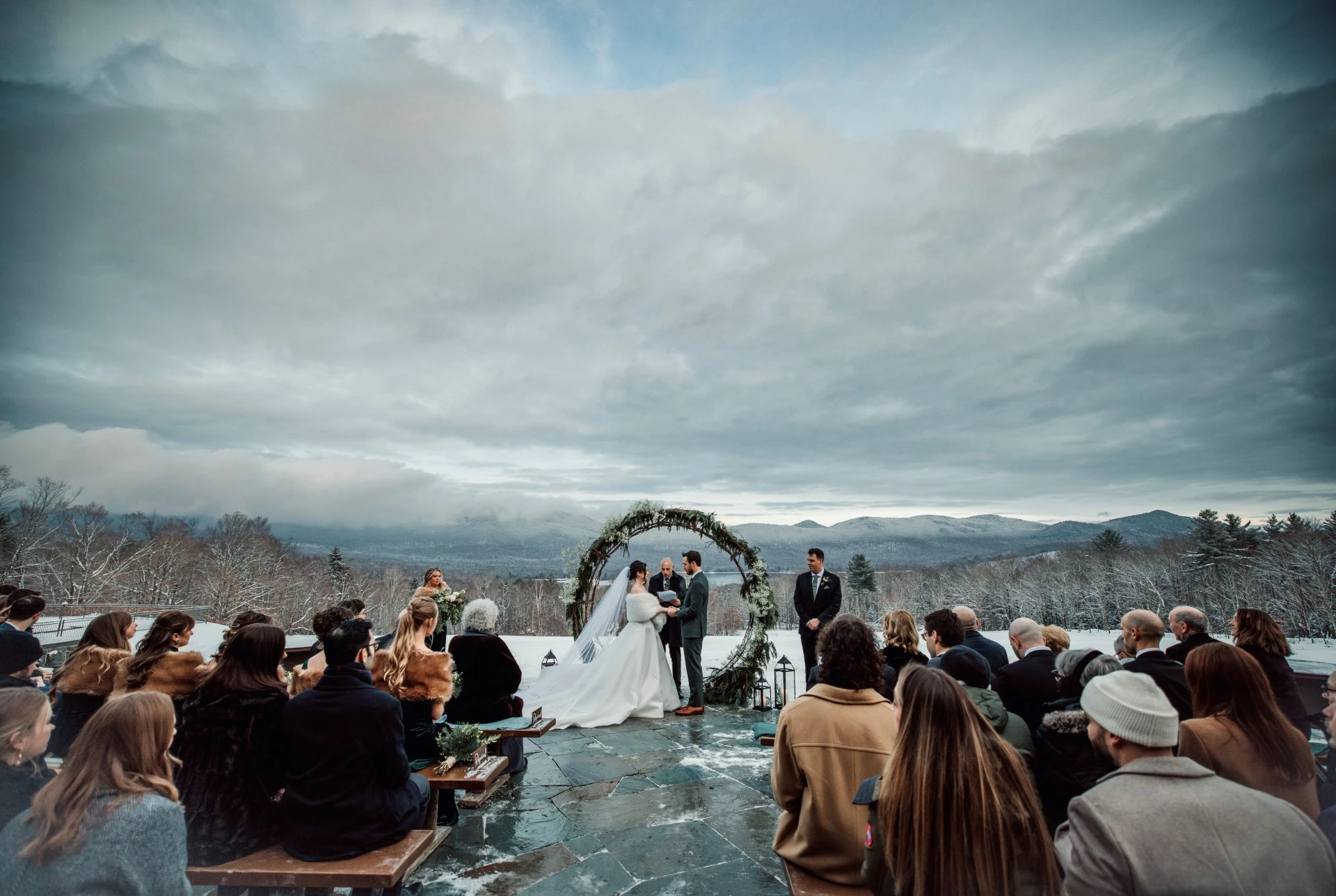 a group of people at a wedding ceremony