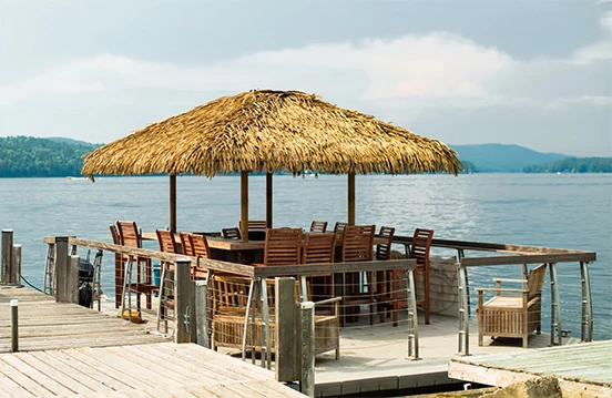 a table and chairs on a dock