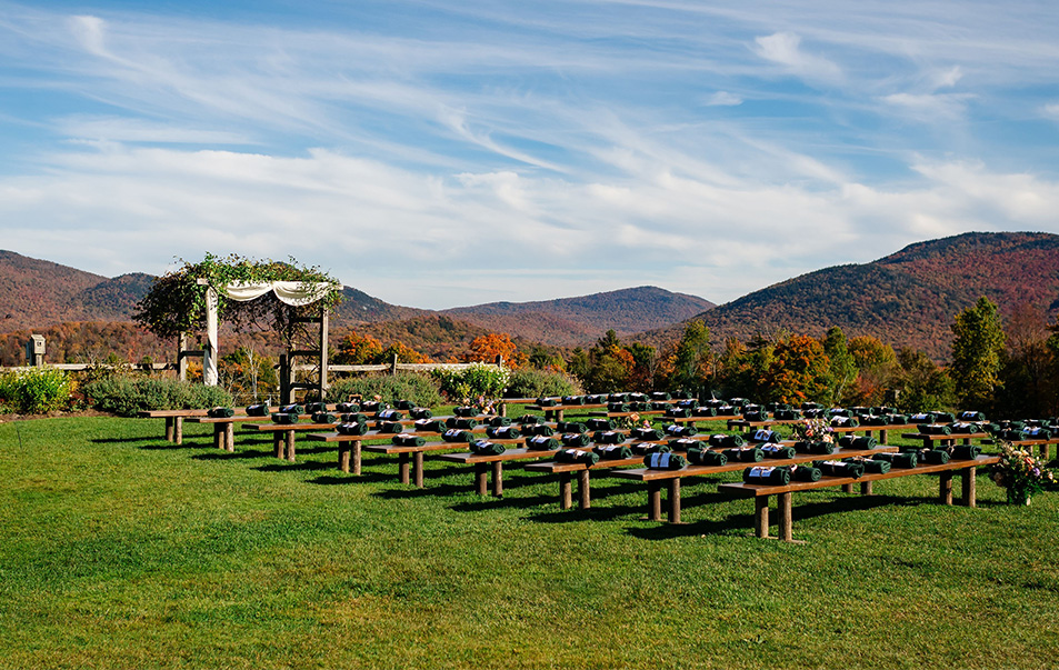a group of benches in a field