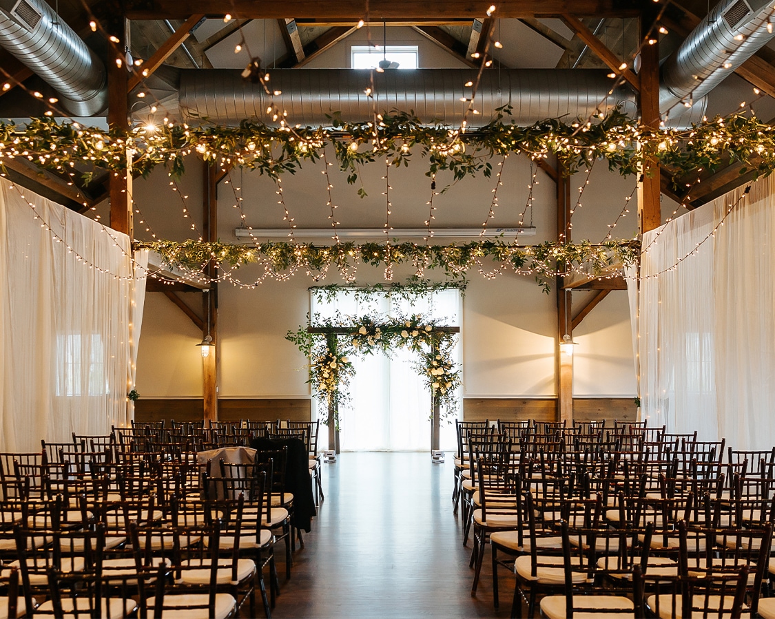 a room with chairs and lights