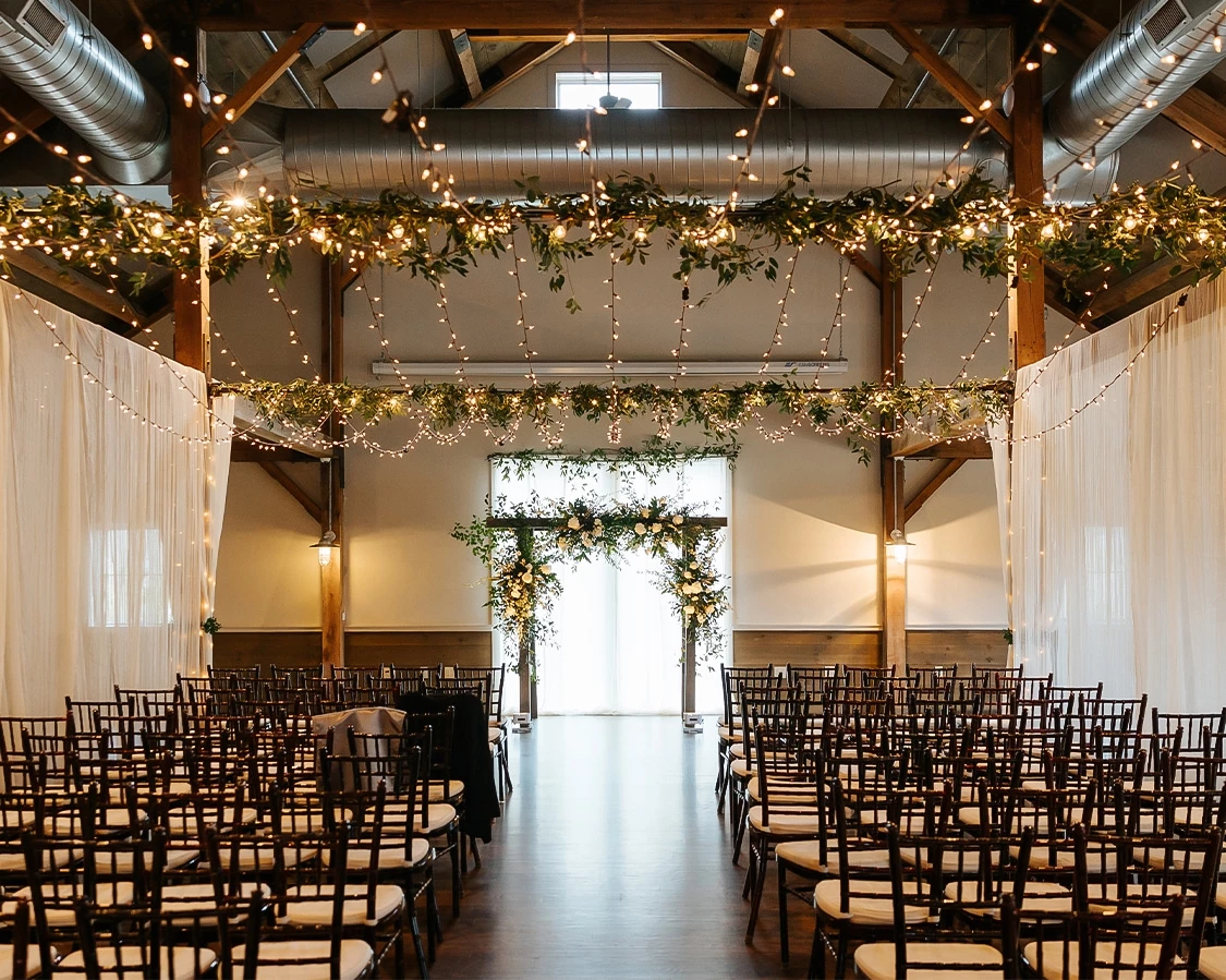 a room with chairs and lights
