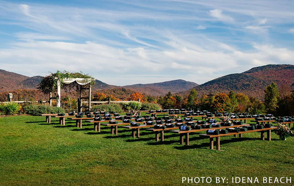 a group of benches in a field