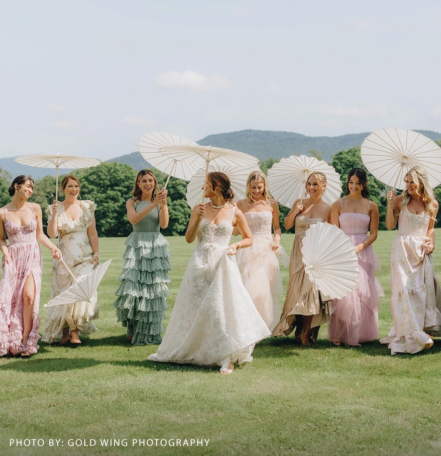 a group of women holding umbrellas