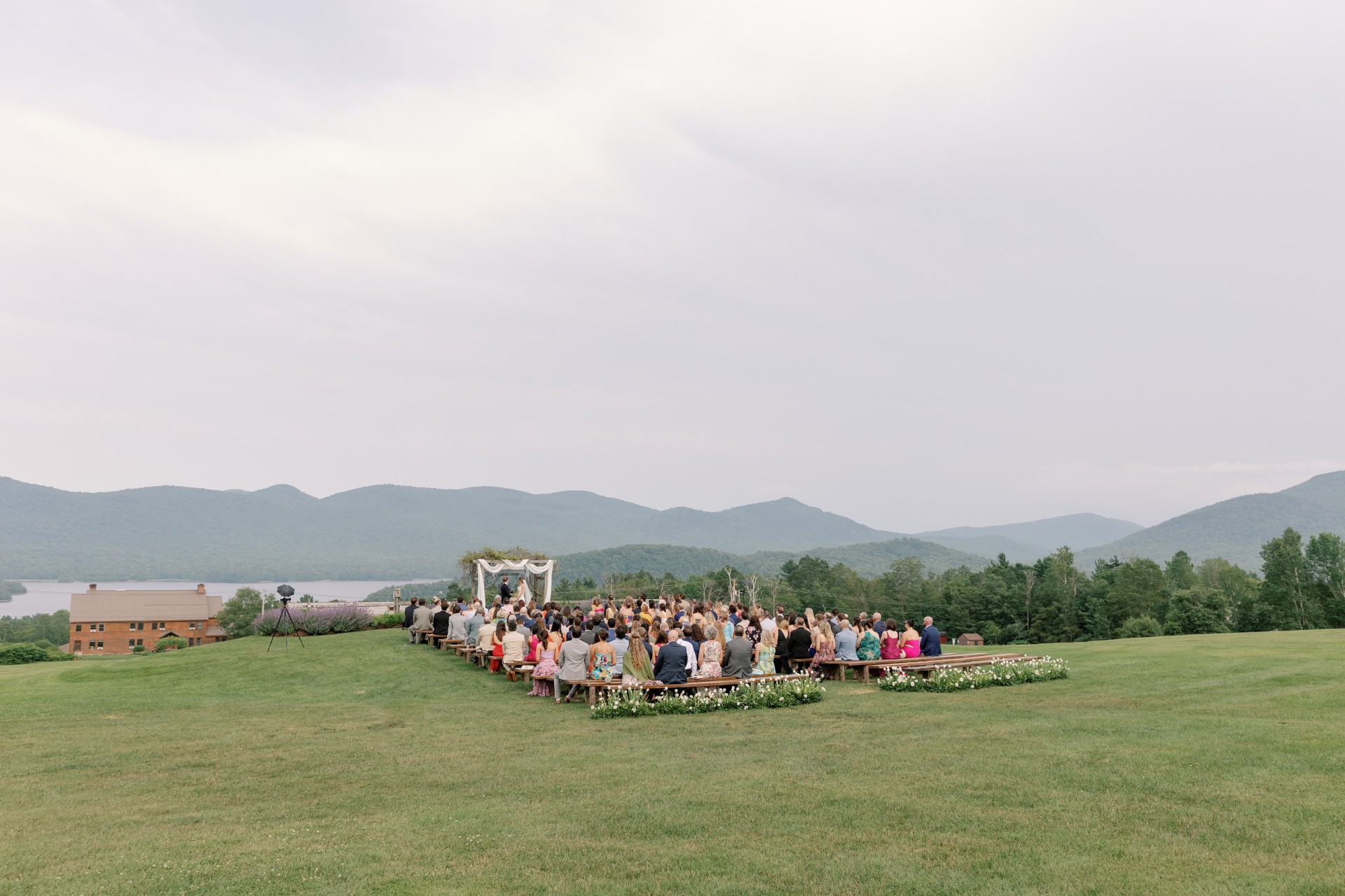 a group of people standing in a large area with a large group of people standing in a large area