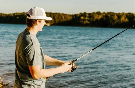 a man fishing on the water