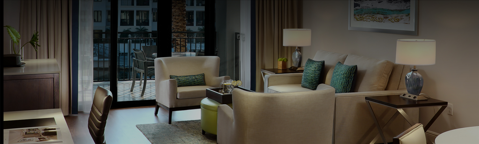 a living room with a couch and chairs