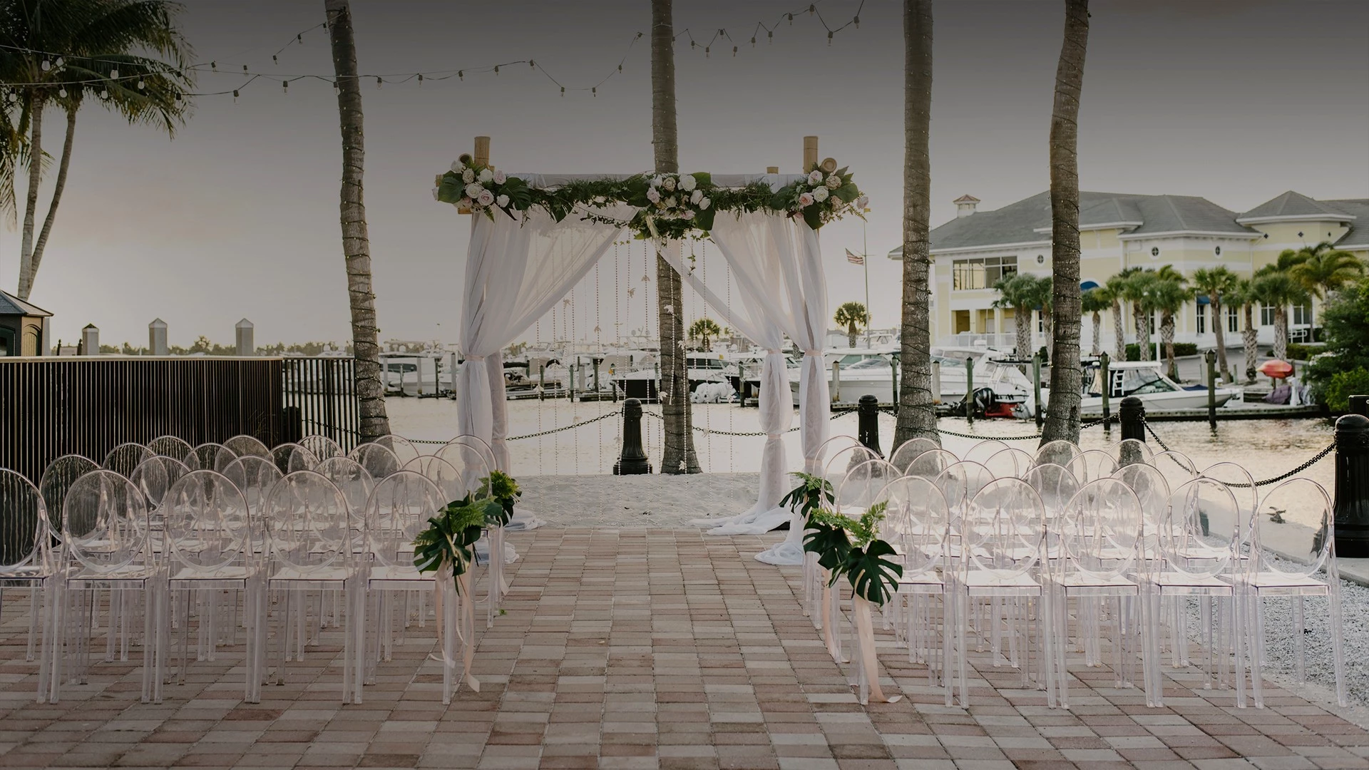 a wedding ceremony set up with chairs and flowers