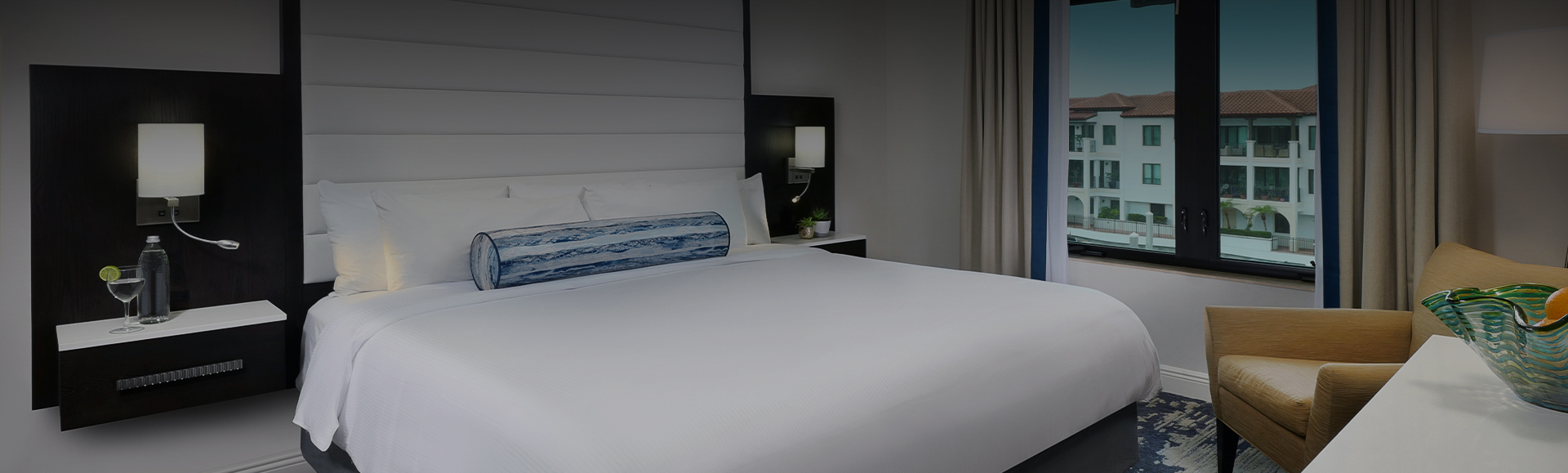 a bed with a pillow on top