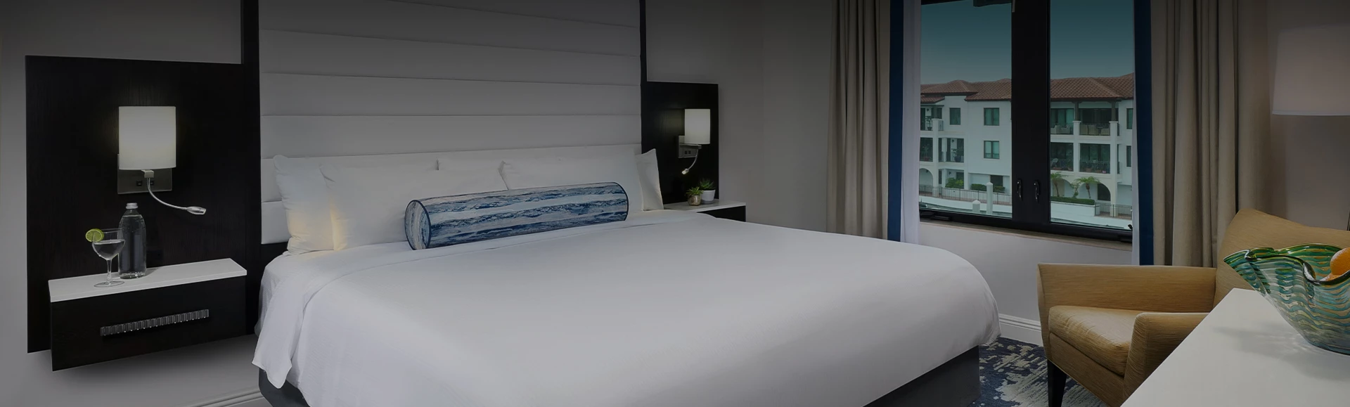 a bed with a pillow on top