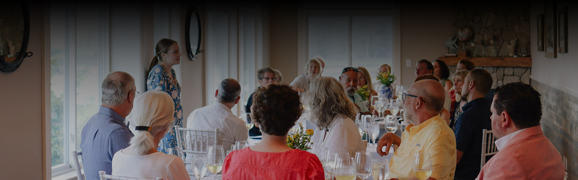 a group of people sitting at a table