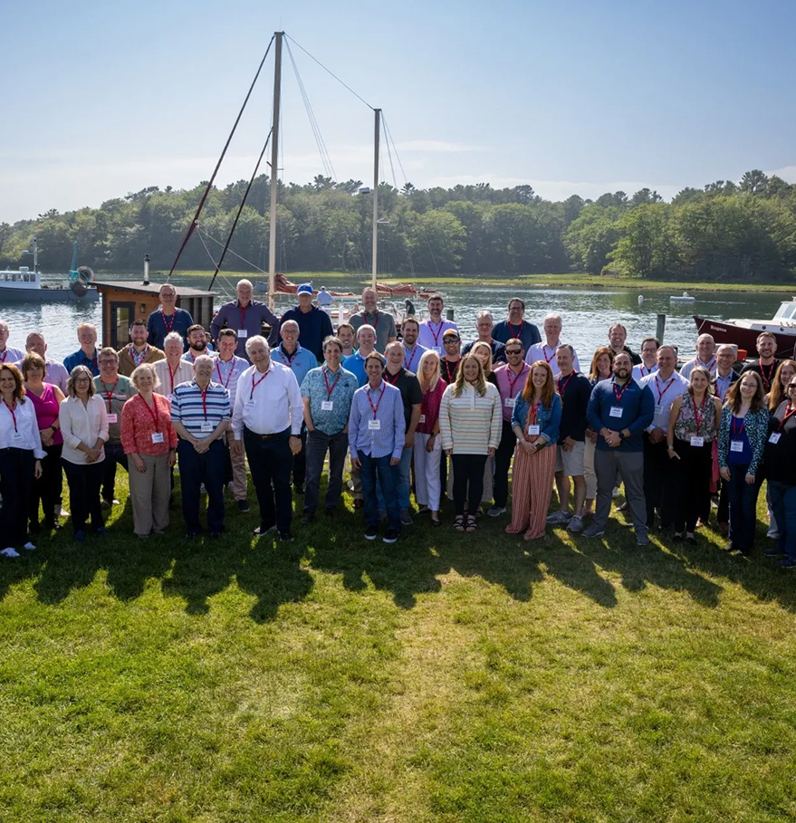 a group of people posing for a photo