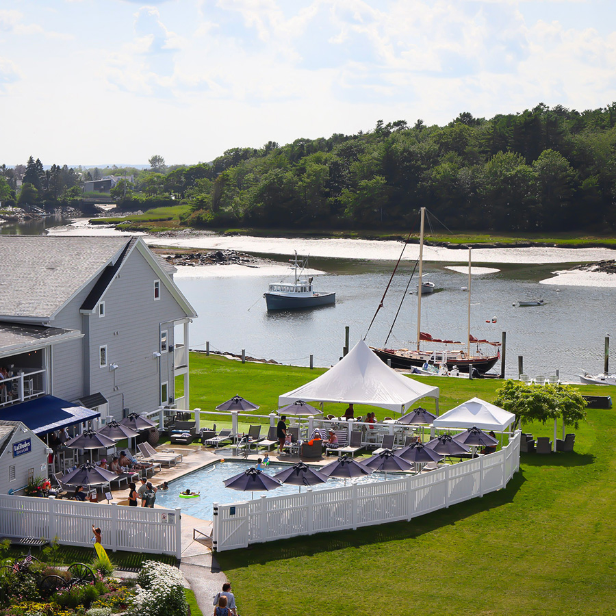 a pool and boats in a body of water