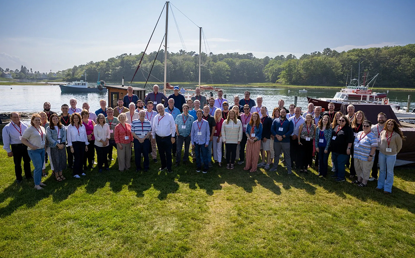 a group of people posing for a photo