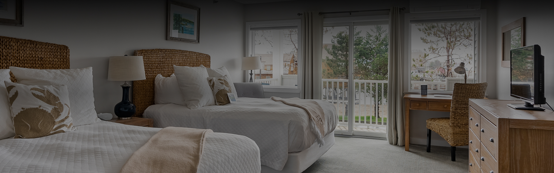 a bed in a room with a glass door