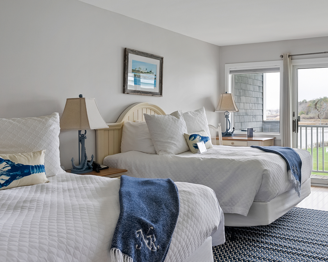 a bedroom with two beds