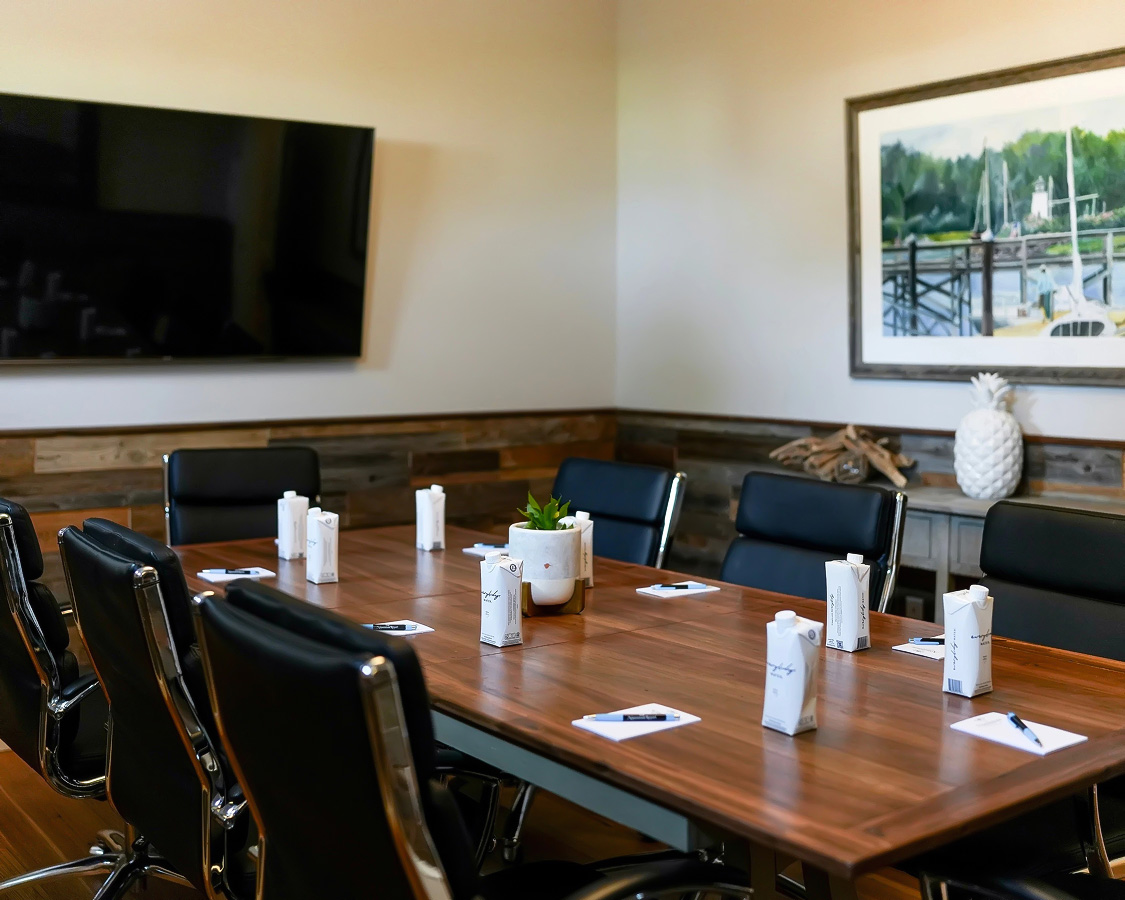 a room with a table and chairs