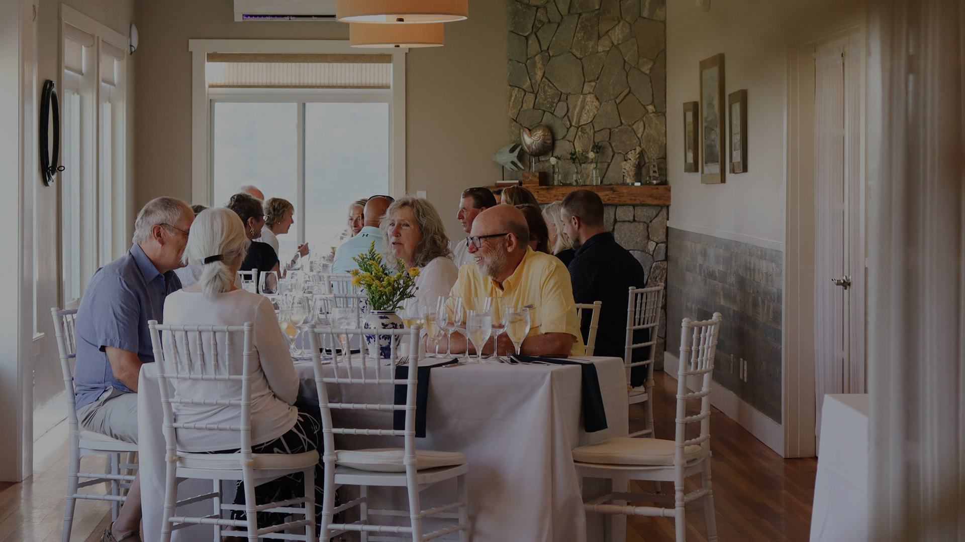 a group of people sitting at tables