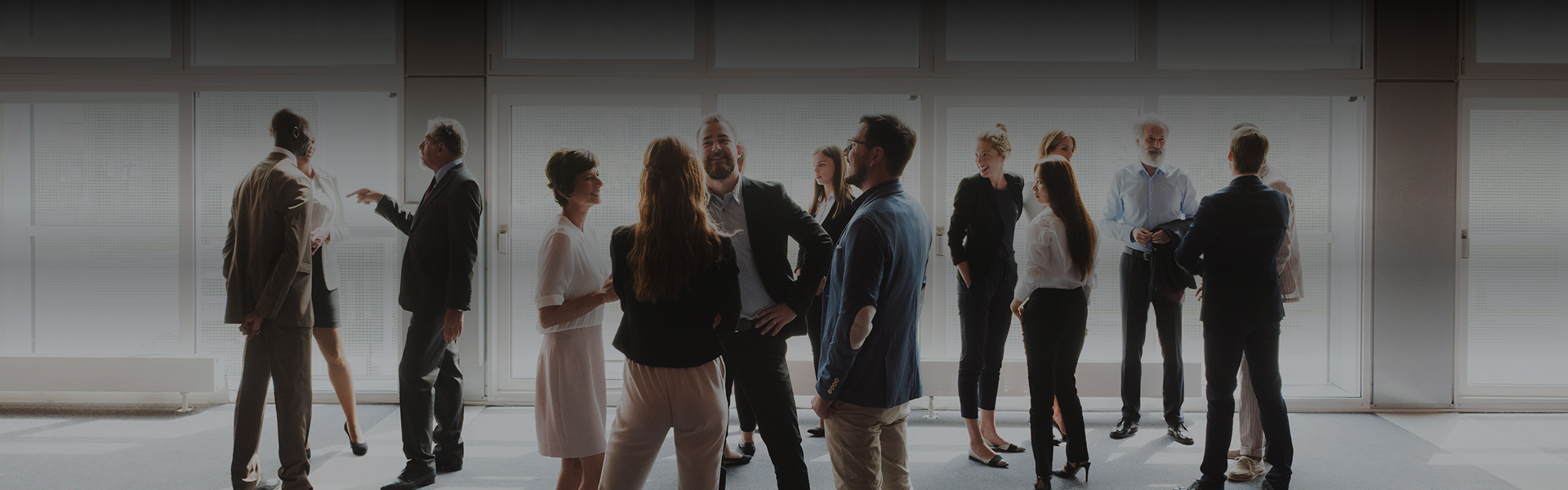 a group of people standing in a room