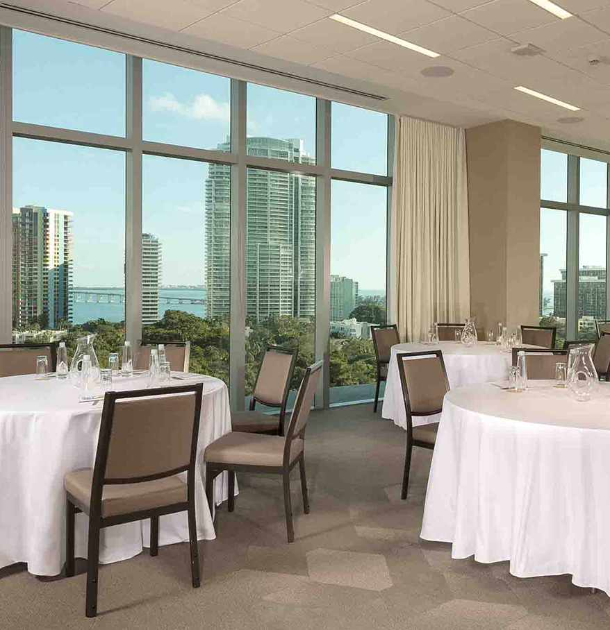 a room with tables and chairs