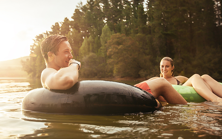 a man and woman in a lake