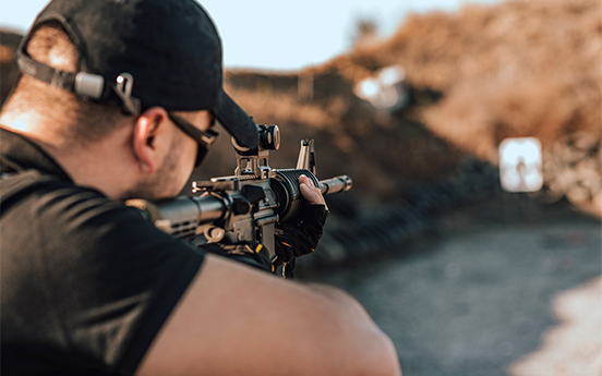 a man holding a gun