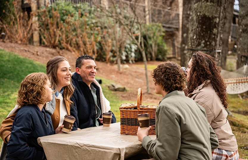 a group of people sitting at a table