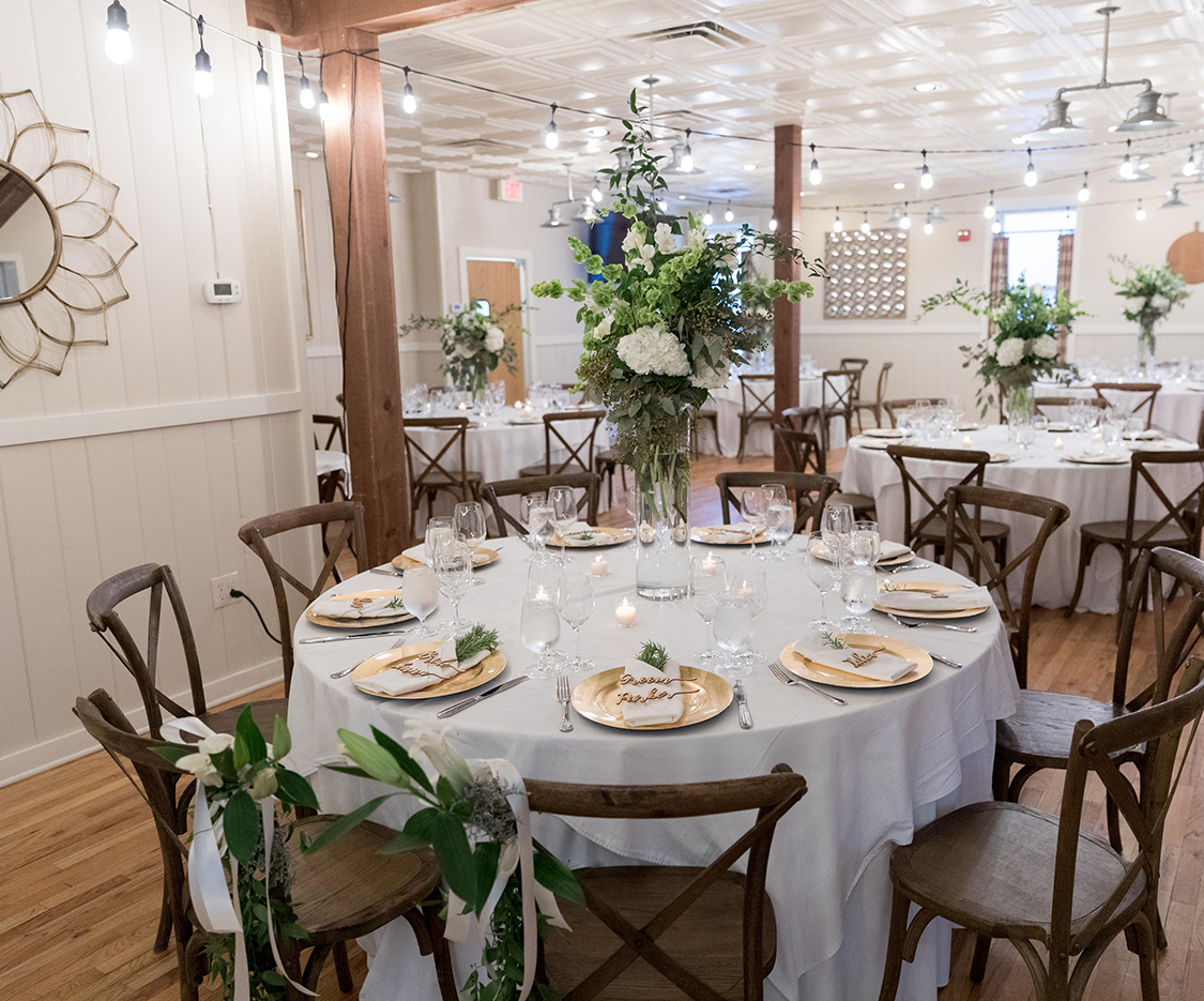 a table set for a wedding reception