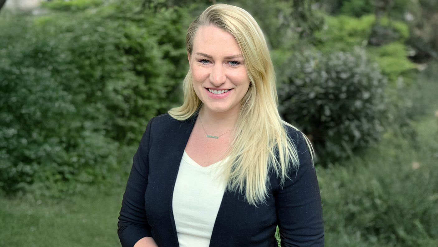 a woman smiling at camera