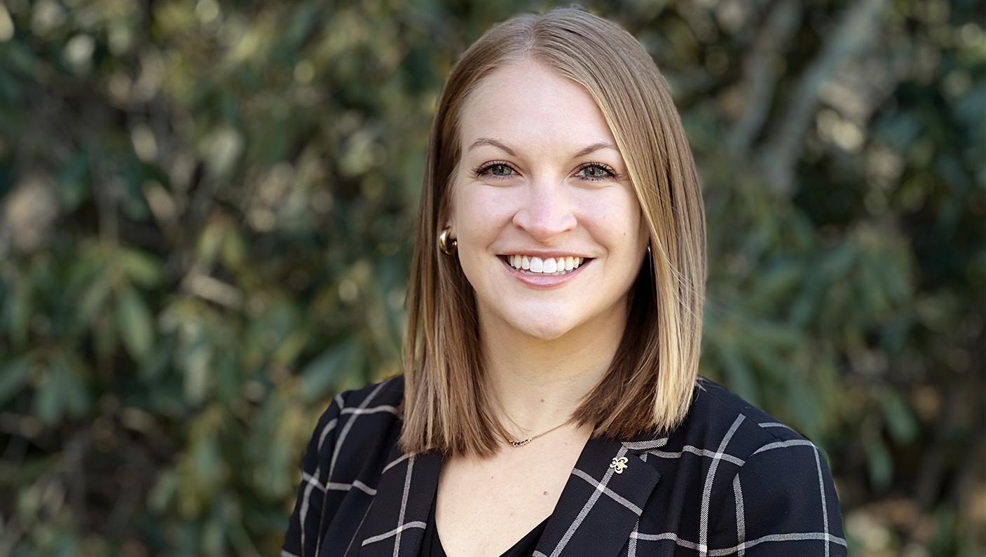 a woman smiling for a picture