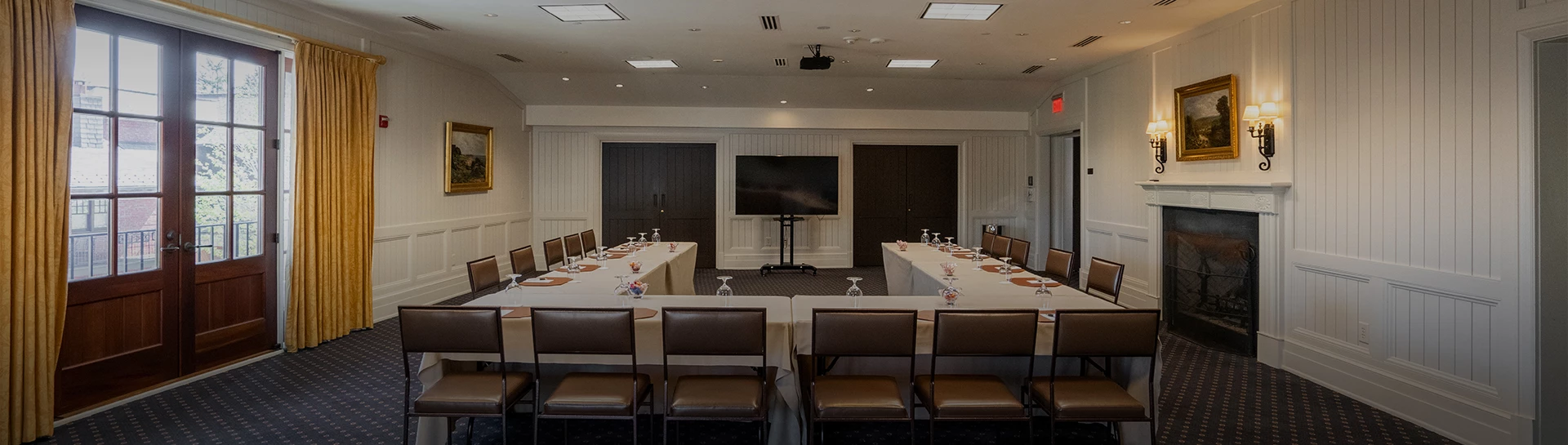 a room with tables and chairs
