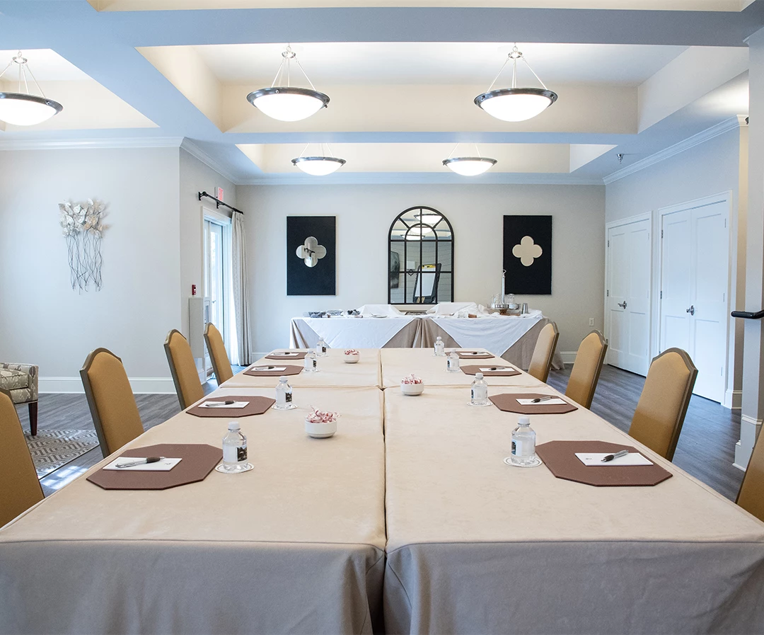 a room with tables and chairs