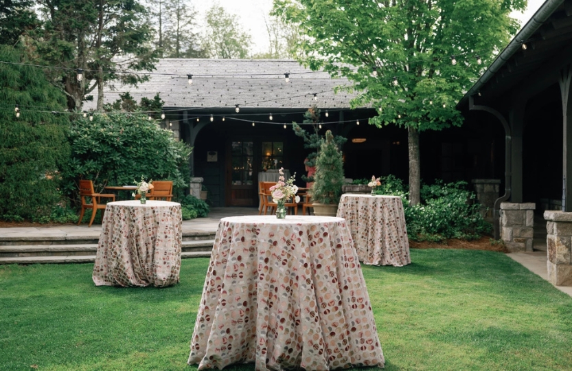 a table covered in tables in a yard