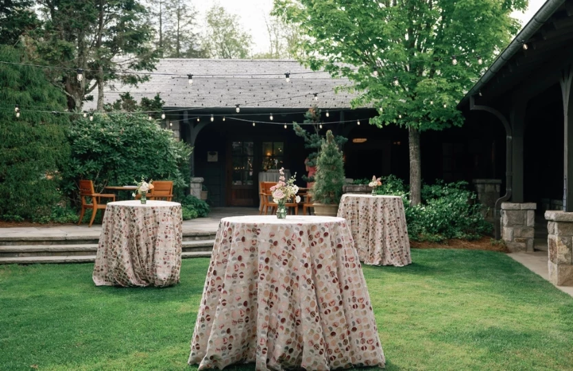 a table covered in tables in a yard