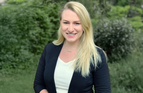 a woman smiling at camera