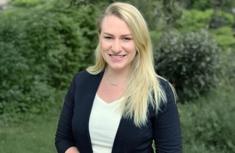 a woman smiling at camera