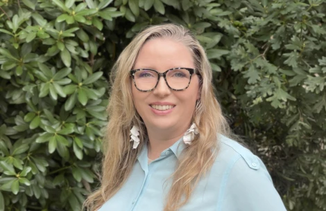 a woman smiling at camera