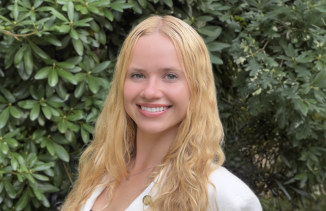 a woman smiling at camera