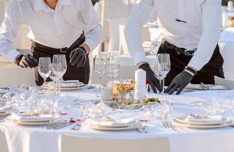 a group of people at a table setting