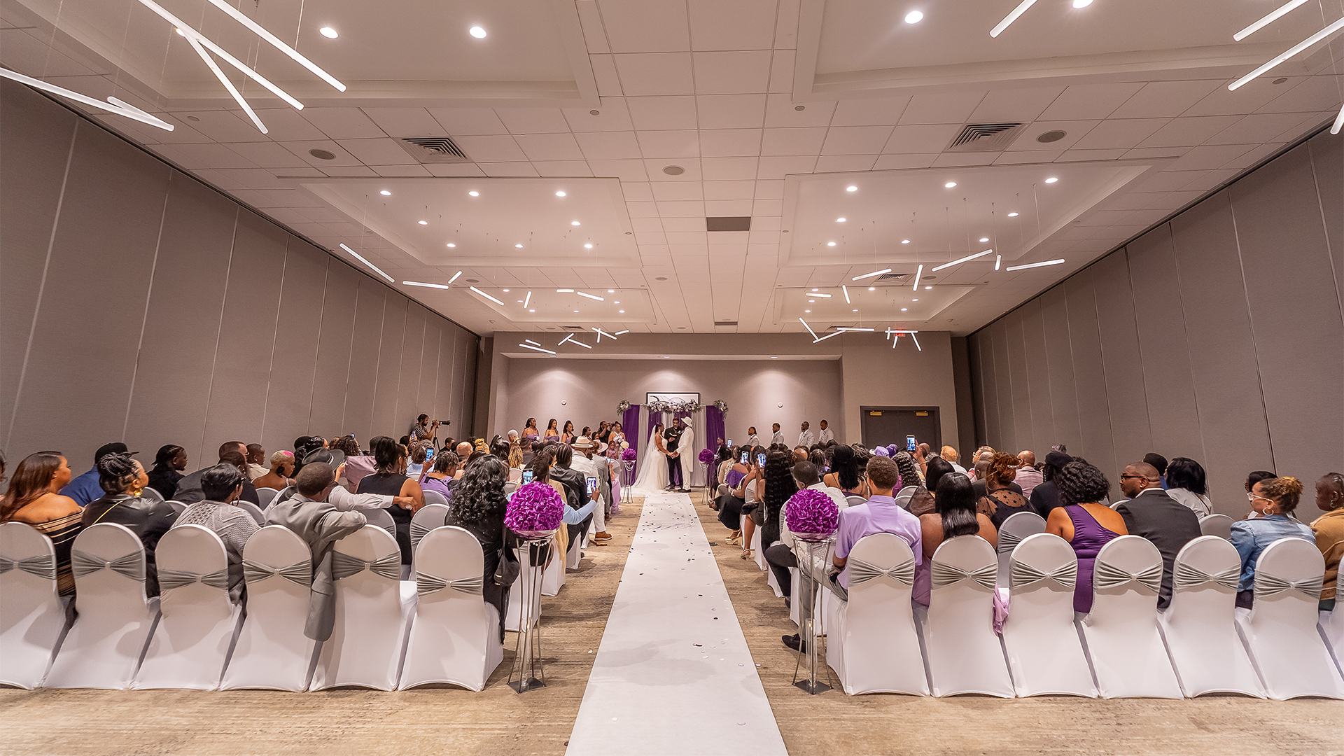 a group of people sitting in chairs in a room