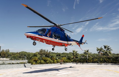 a helicopter flying over a rooftop