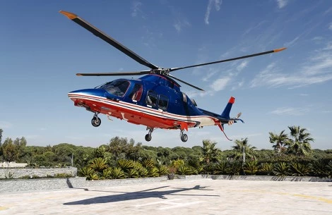 a helicopter flying over a rooftop