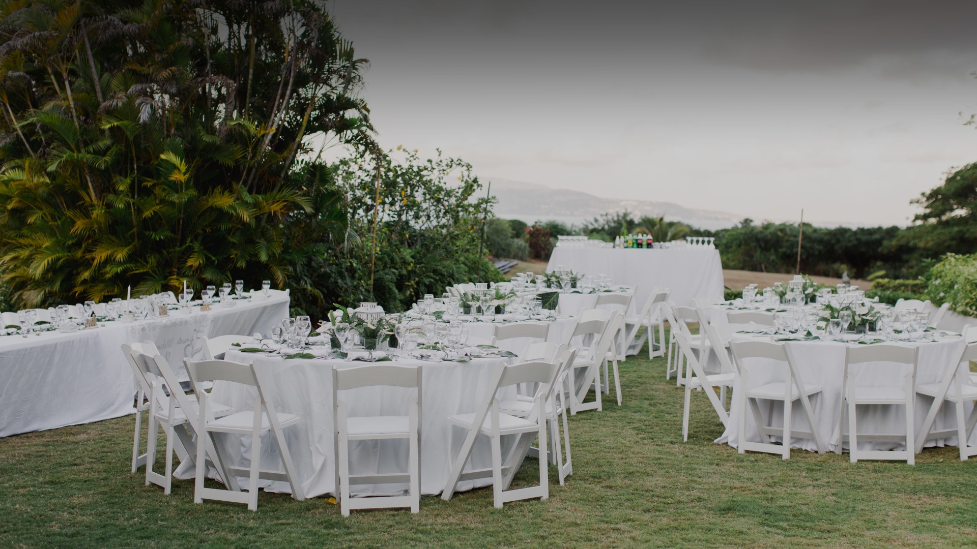 a group of tables set up for a party