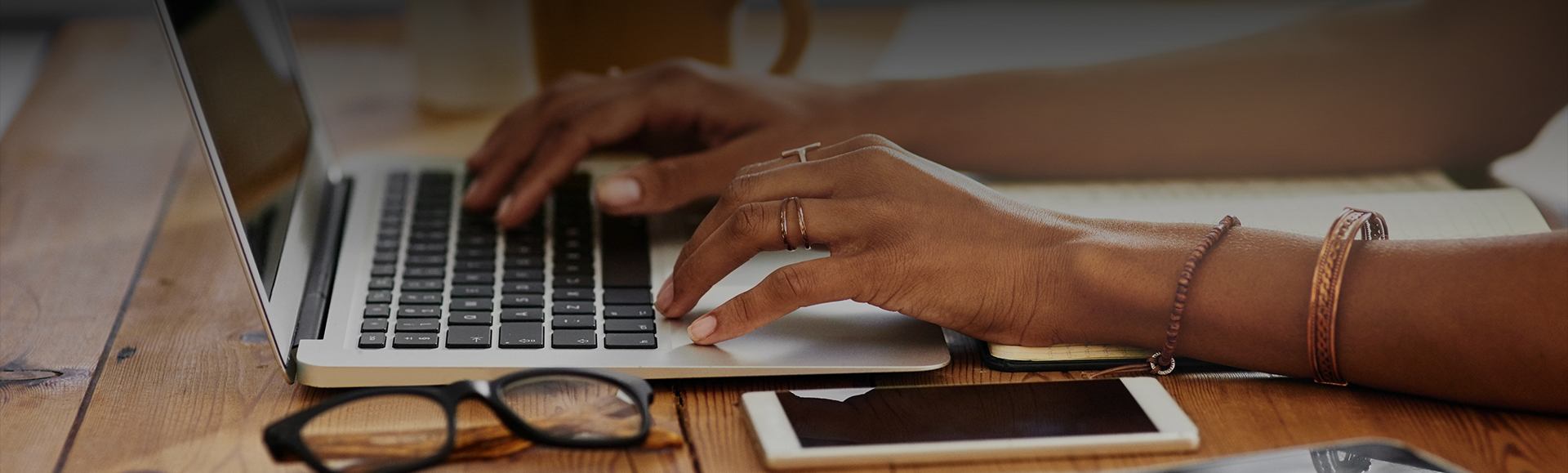 a person typing on a laptop