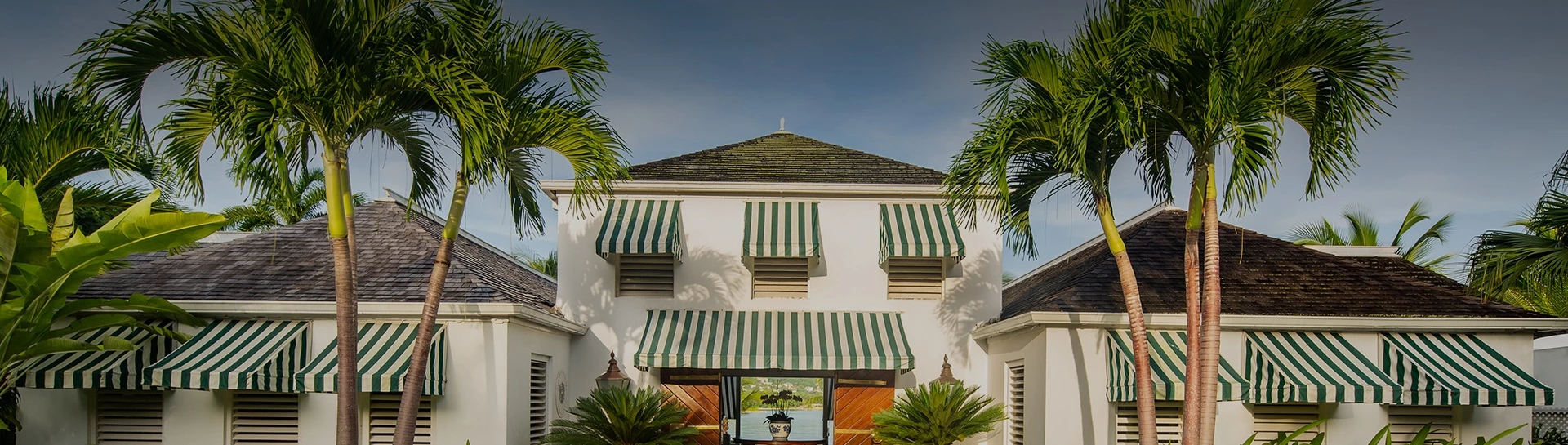 a building with palm trees